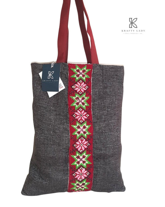 Dark Handwoven Tote Bag with Traditional Geometric Embroidery – Red & Green Accents