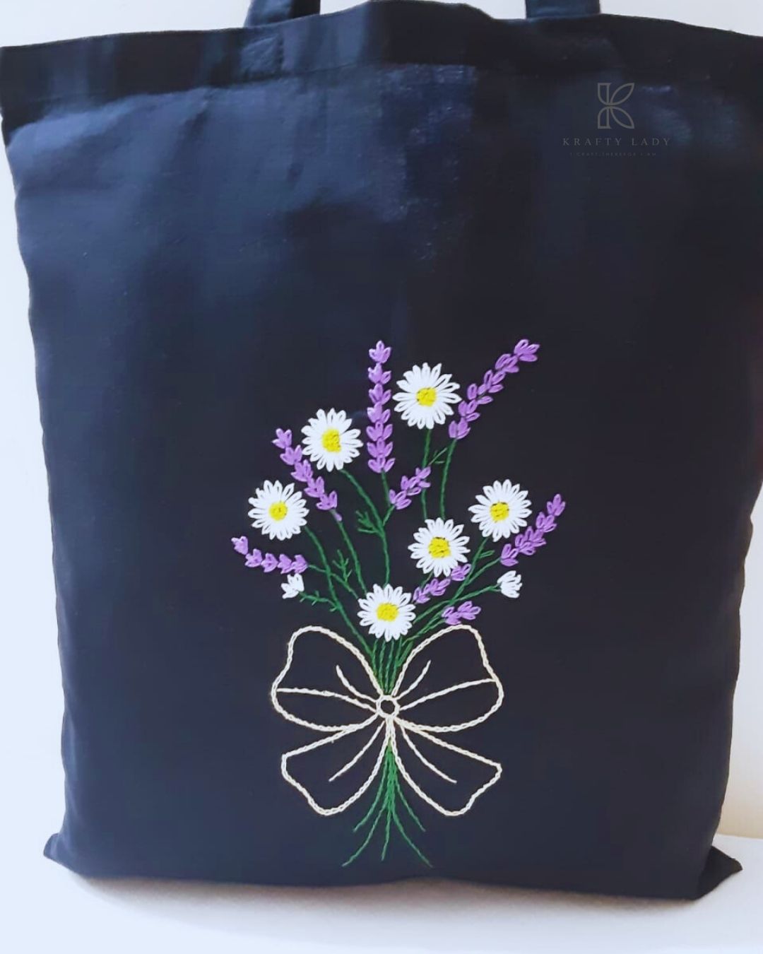 Black tote bag with floral design